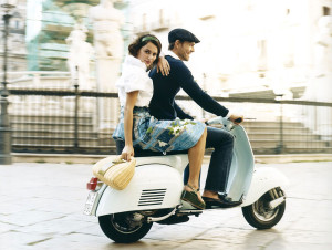 couple on vespa